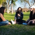 Three women talking in substance abuse group therapy activities