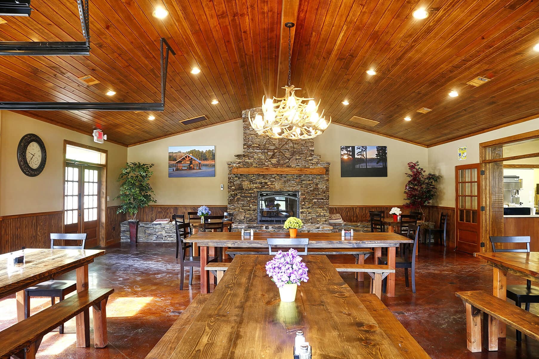 Dining hall with wooden ceiling and tables