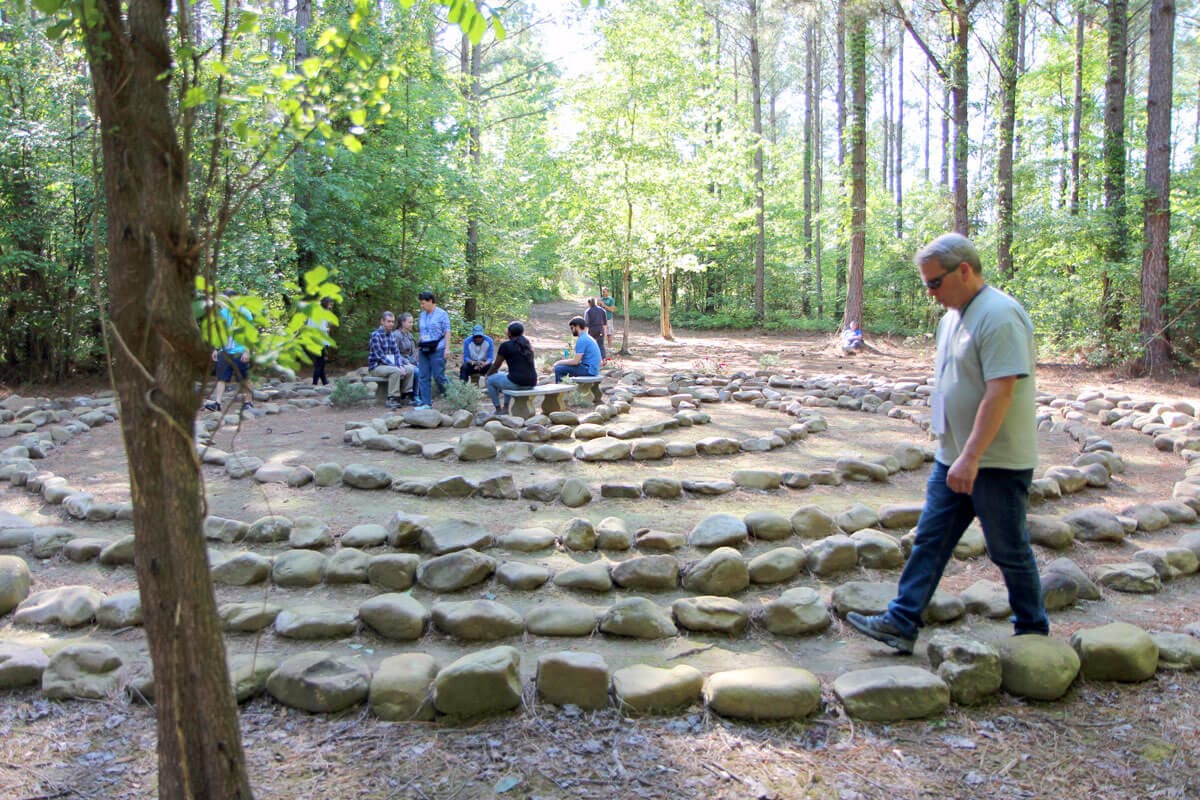 Alumni, families and staff share a mindfulness experience at the labyrinth