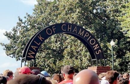 Group of people walking together for the walk of champions